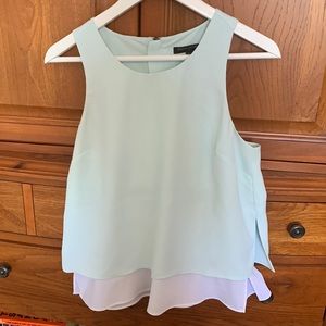 Like new, summery tank top that is lightweight, but dressy!  Pale aqua/white.